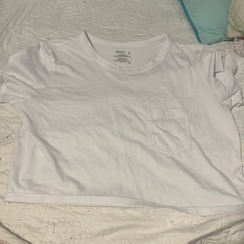 woman’s small white crop top